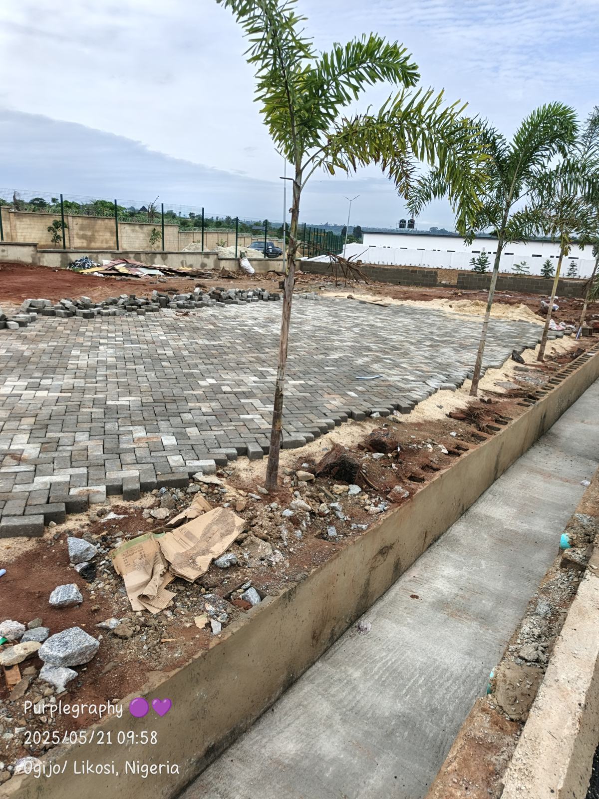 Interlocking paving and a concrete drain at a Raincast project site